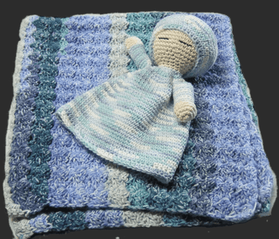 Child's blanket and doll